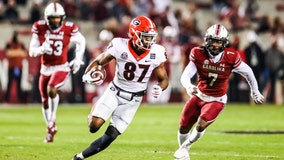 No. 13 Georgia runs all over South Carolina in 45-16 victory