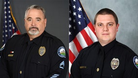 Roswell police officers rush to help man involved in crash