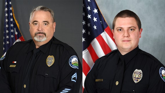 Roswell police officers rush to help man involved in crash