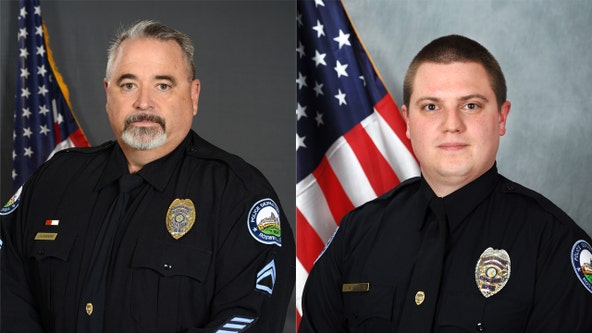 Roswell police officers rush to help man involved in crash