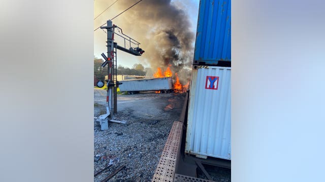 No injuries in fiery crash involving tractor-trailer, train in Clayton County