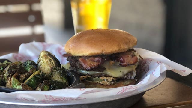 Burgers with Buck takes a bite out of Taco Mac's newest burgers