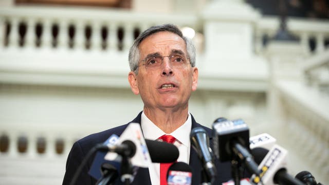 While dealing with death threats, Raffensperger says recount tracking toward Biden win in Georgia