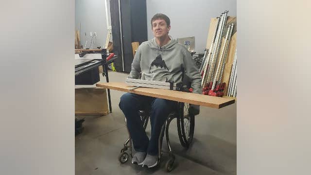 Paralyzed military veteran uses woodworking to help others