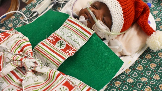 Atlanta nurse 'gift wraps' NICU babies in handmade blankets that look like presents