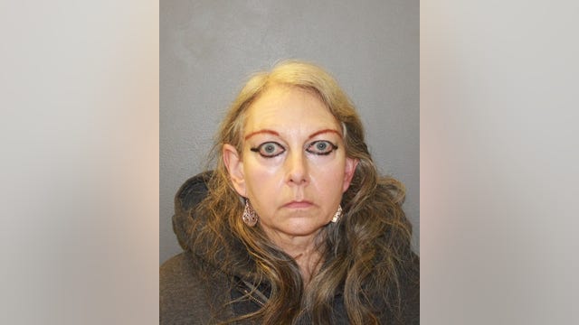 Woman arrested after police find dead animals inside home