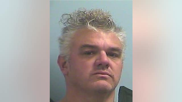 Sheriff: Dawson County teacher accused of improper surveillance of a child