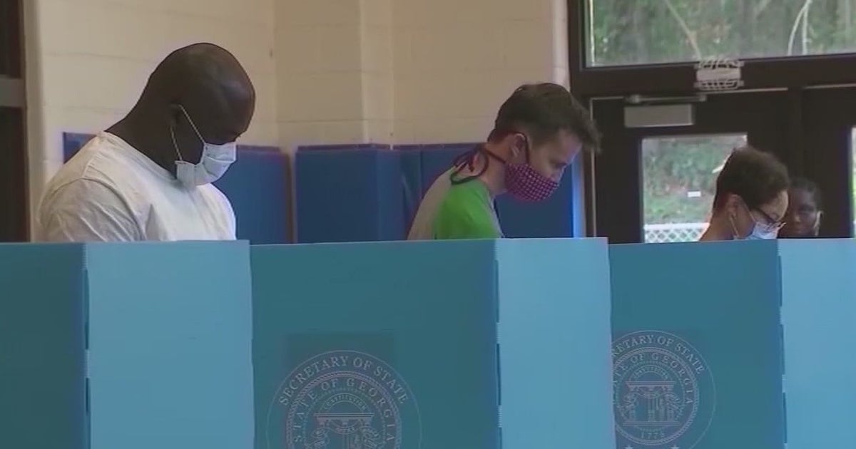 Voters make final push to polls in high-stakes Georgia Senate runoffs ...