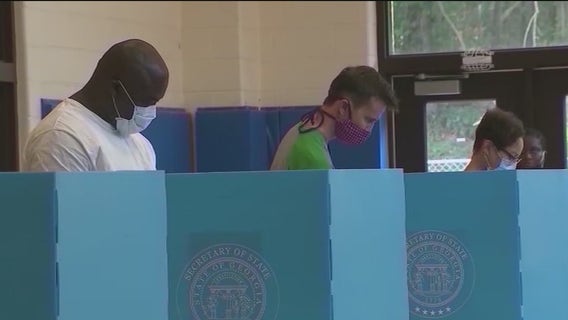 Voters make final push to polls in high-stakes Georgia Senate runoffs