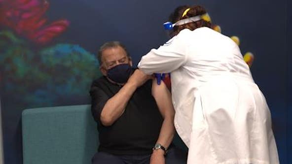 Atlanta civil rights leaders get COVID-19 vaccine to ease public distrust