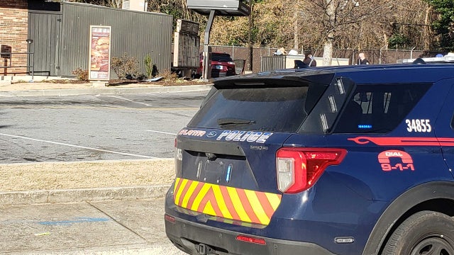 Police: Officer forced to open fire on armed suspect, no one injured