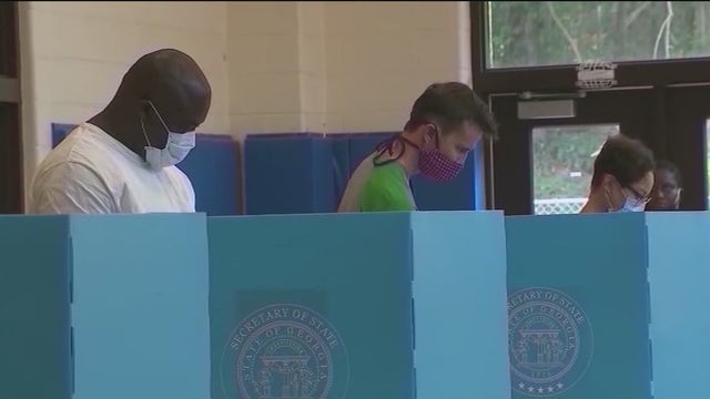 Voters make final push to polls in high-stakes Georgia Senate runoffs