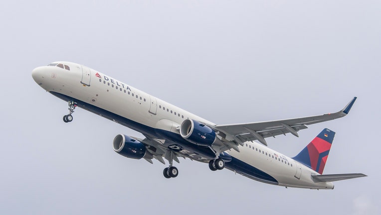 A Delta Air Lines Airbus A321 in the sky