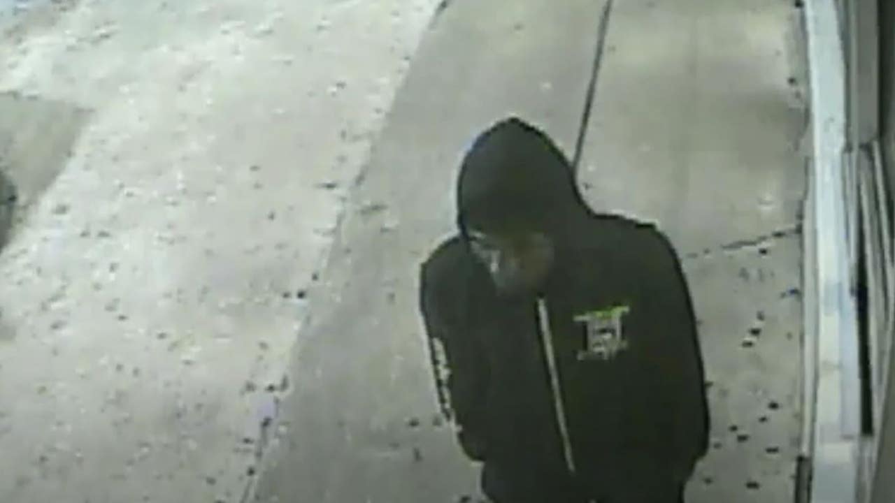 Police release footage of gunman wanted in death of father of 4