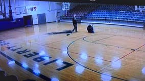 'Nothing but net': School custodian sinks half-court shot with back turned