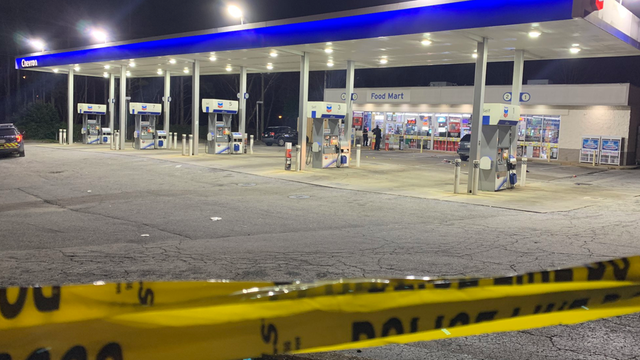 Gas station gun battle ends with 1 dead, 1 hospitalized