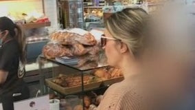 Video: Woman hurls racial slurs at bagel shop worker