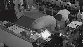 Video captures 2 burglars breaking into Atlanta cell phone shop