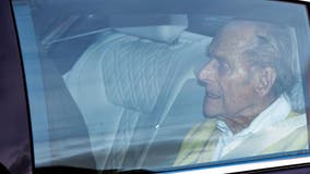 UK's Prince Philip leaves hospital after 4-week stay for infection, heart procedure