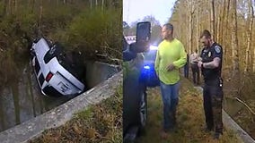 Georgia officer, Good Samaritan rescue man trapped in vehicle