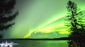 Northern Lights dance across the skies above Alaska's Glacier Bay National Park