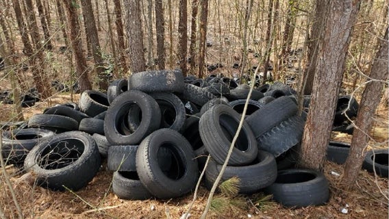 2 charged, thousands of used tires discovered dumped in Lilburn
