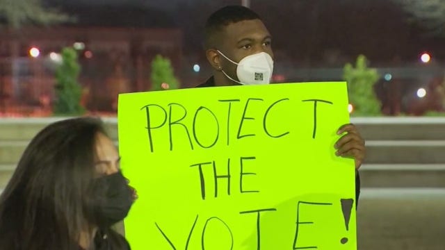 Parts of sweeping new Georgia election law debated in court