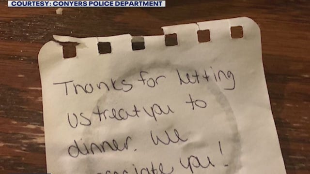 Conyers police officers moved by stranger's generous gift