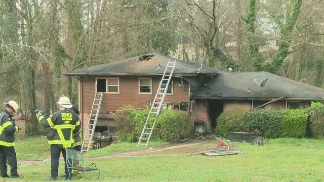 Woman in critical condition after house fire in DeKalb County