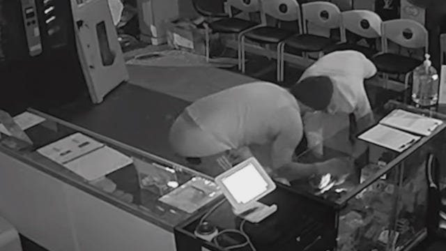 Video captures 2 burglars breaking into Atlanta cell phone shop