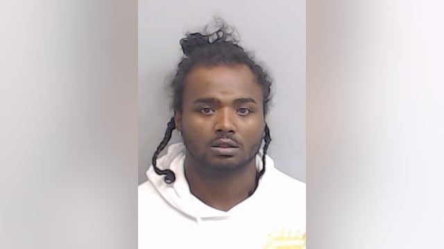 Man arrested for murder of 25-year-old man, police say