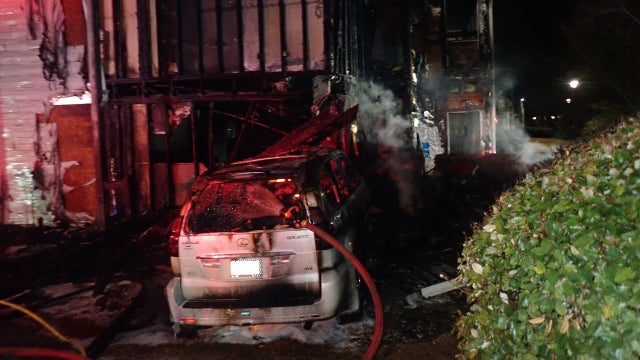 Arrest made after car crash sparks apartment fire