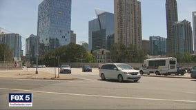 Teen selling water on busy Buckhead roadway stuck by car