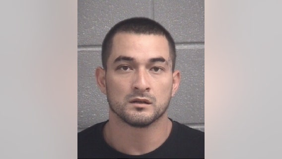 Suspect charged with murder of men found inside burning pickup truck