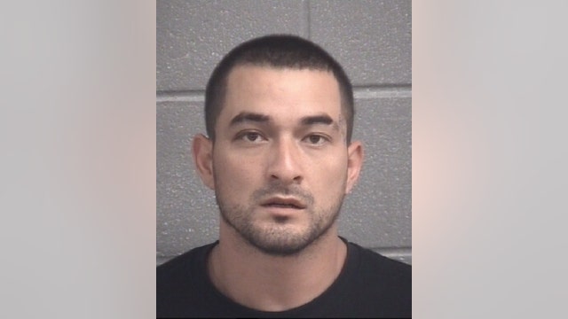 Suspect charged with murder of men found inside burning pickup truck