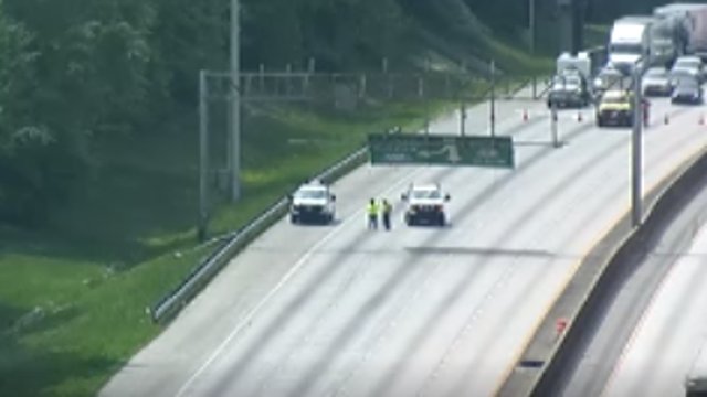 Sign hanging over I-85 North closes all lanes in Fulton County