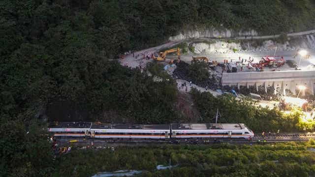Truck knocks train off tracks in Taiwan, killing at least 48