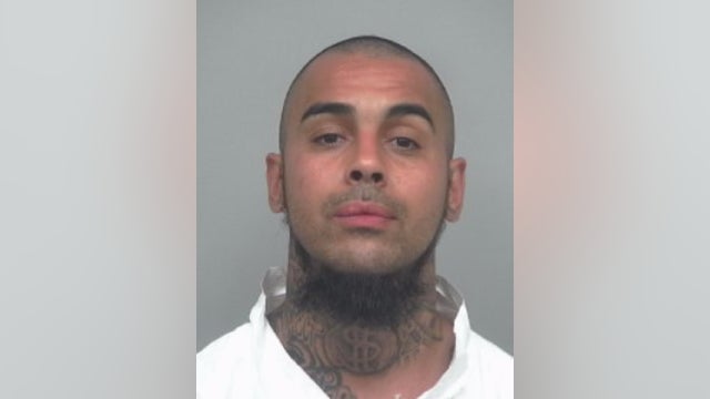 Police: Man arrested for shooing friend while riding in SUV