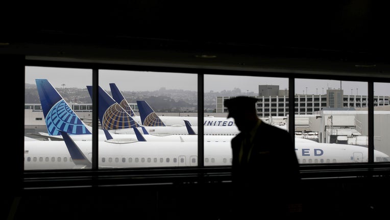 49c1e9c4-San Francisco Airport Terminal Serves Very Few Passengers During COVID-19 Pandemic