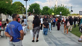 Demonstrators rally in downtown Atlanta to honor George Floyd one year after murder