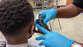 Free haircuts boost students' confidence at Henry County school