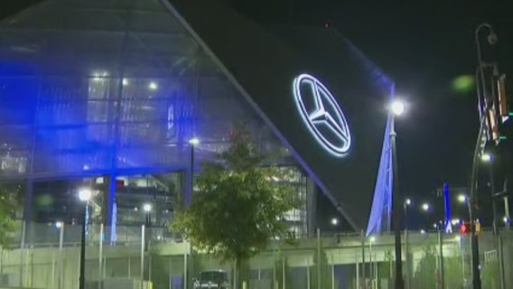 Woman shot while driving near Mercedes-Benz Stadium, police say