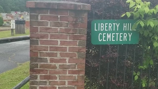 Controversy surrounds maintenance of historic cemetery after flowers, mementos thrown away