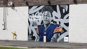 Kennesaw business fined for mural of athlete