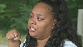 East Point mother survives violent carjacking, suspect still at large