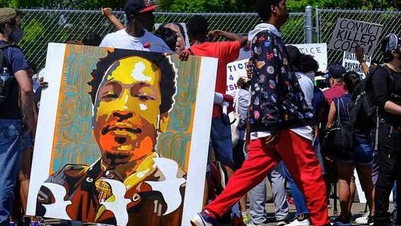 Crowd gathers at site of Rayshard Brooks killing on one year anniversary