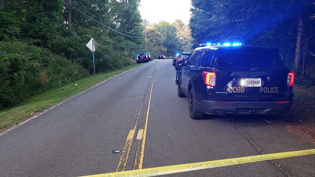 Cobb County officer shot, hospitalized; suspect later shot and killed, police say