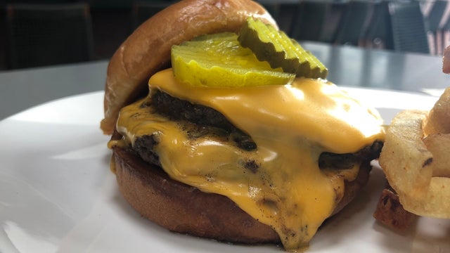 Burgers with Buck takes a bite at Westside's The Woodall