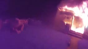 ‘I got you’: Video shows NY police officer rescuing family from burning house