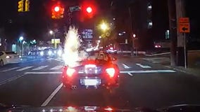 VIDEO: Driver burned after lit firework tossed into convertible